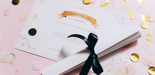 a printed certificate with a ribbon around it