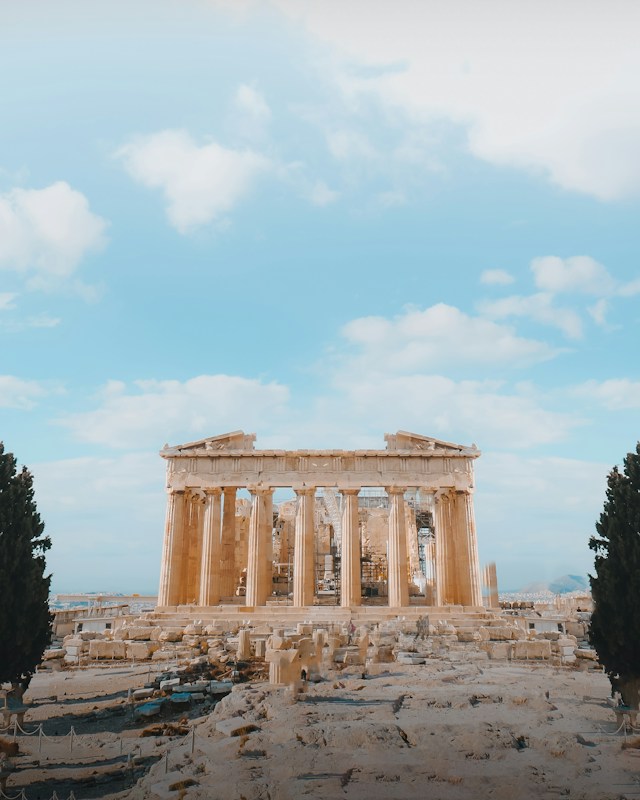 The Acropolis of Athens against a light blue sky